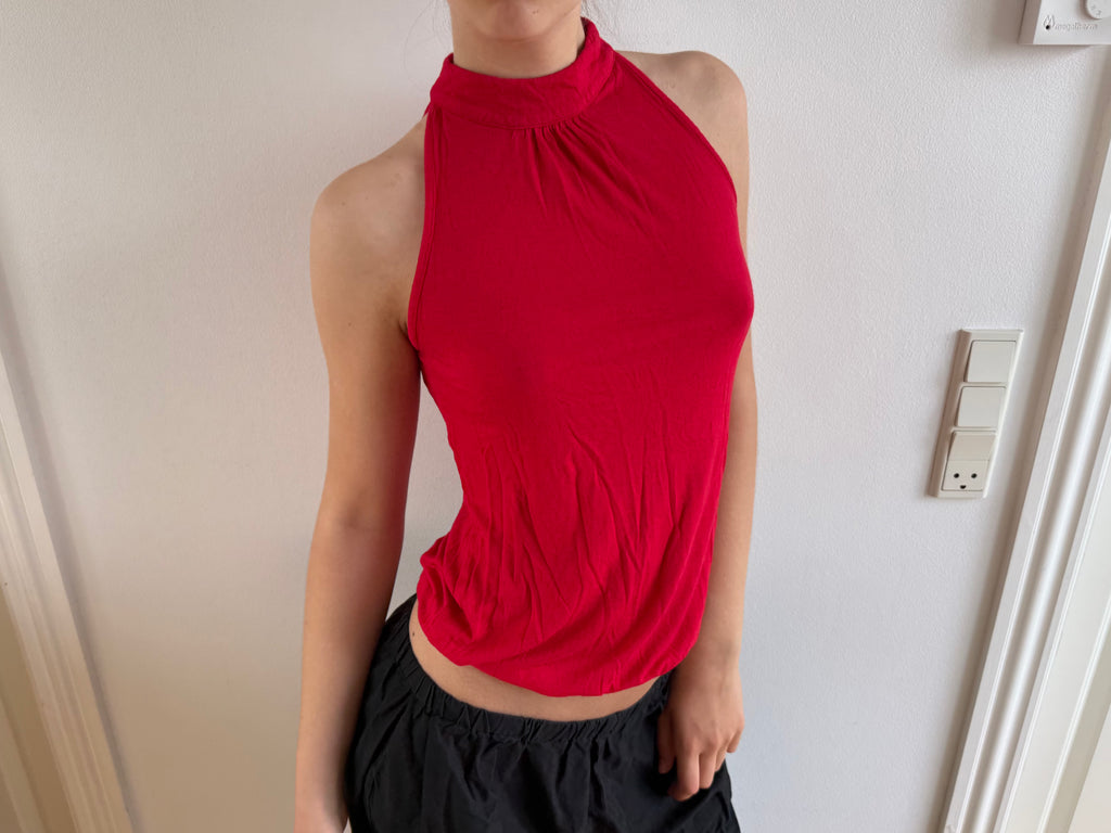 Red sleeveless top