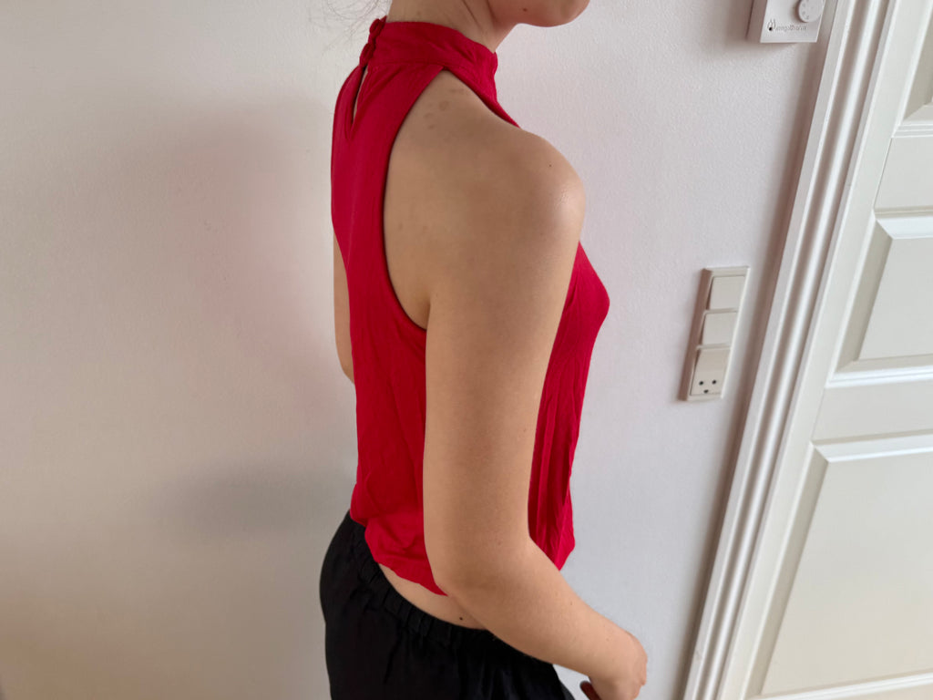 Red sleeveless top