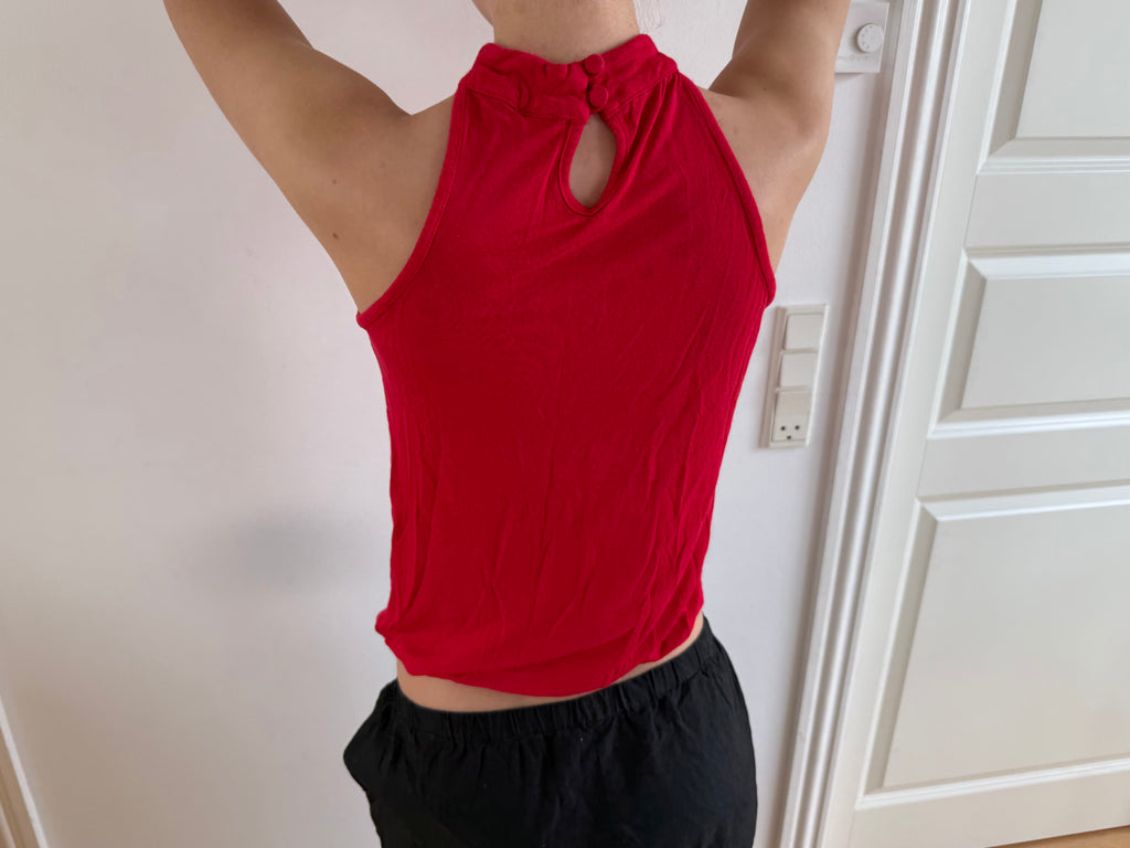 Red sleeveless top