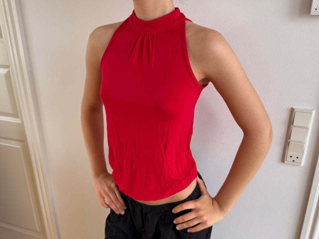 Red sleeveless top