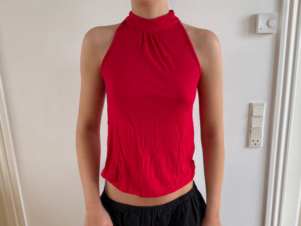 Red sleeveless top