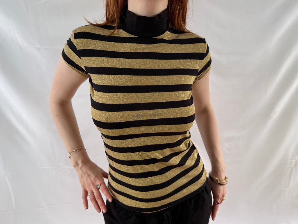 Striped gold and black turtleneck top