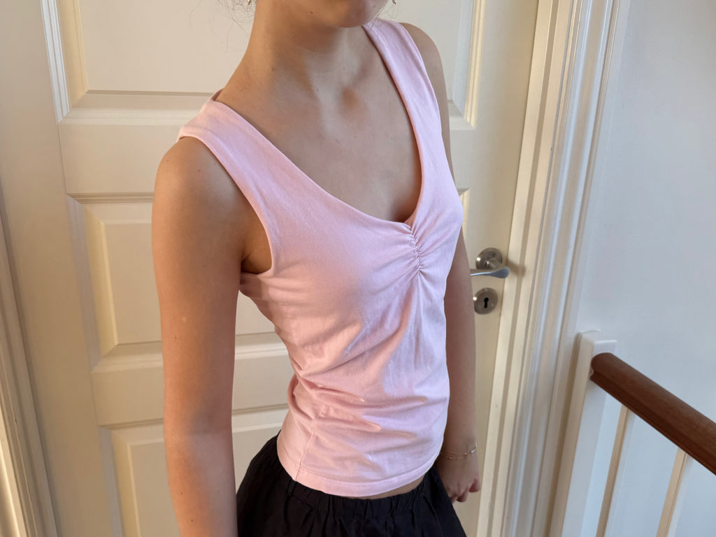 Pink top with V-neck