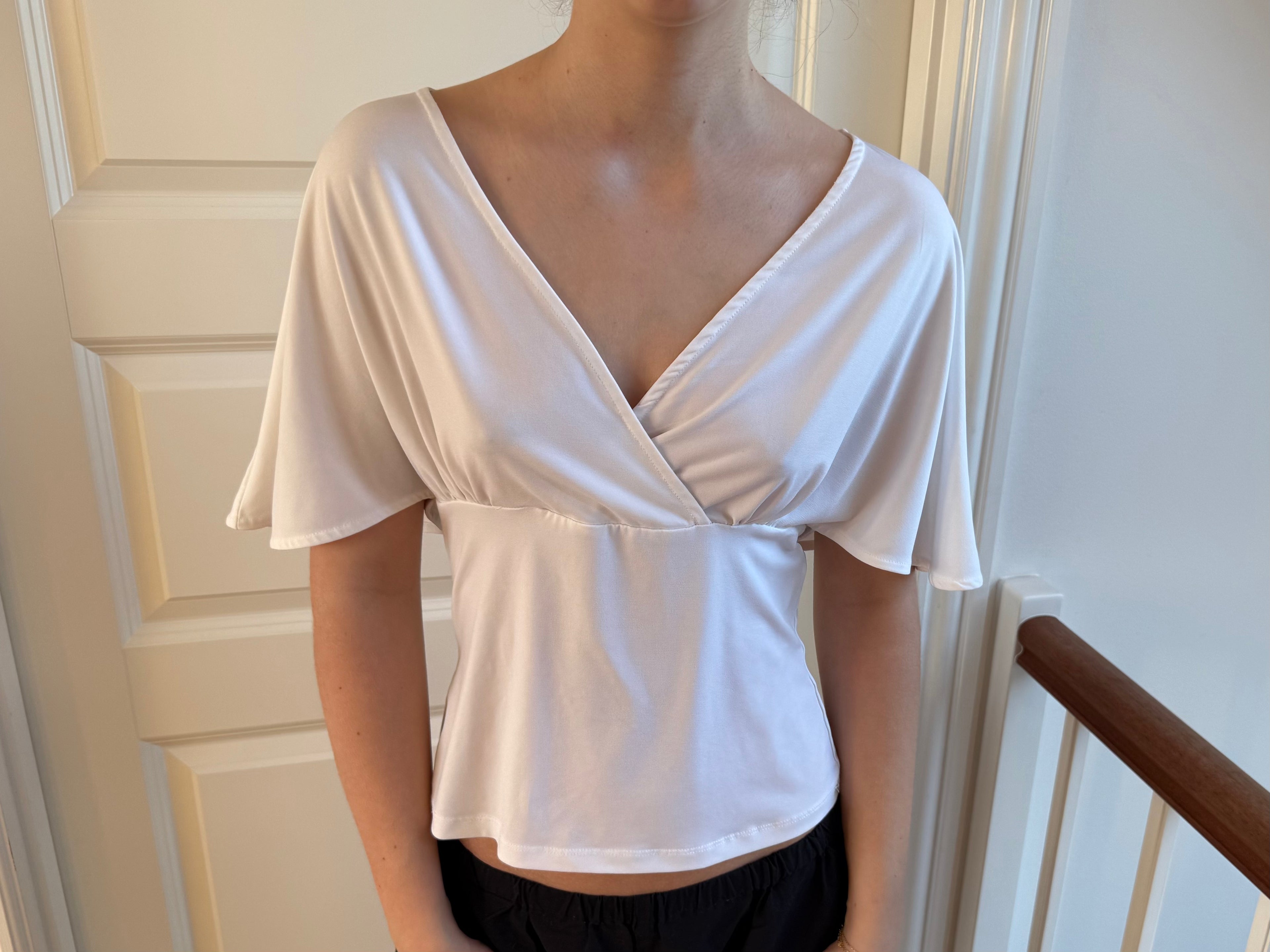 Hvid flowy top ærmer