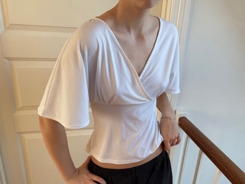Hvid flowy top ærmer