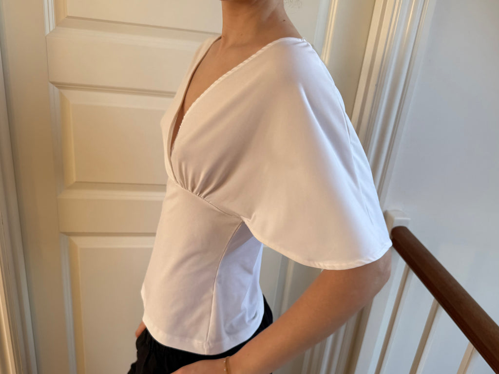 Hvid flowy top ærmer
