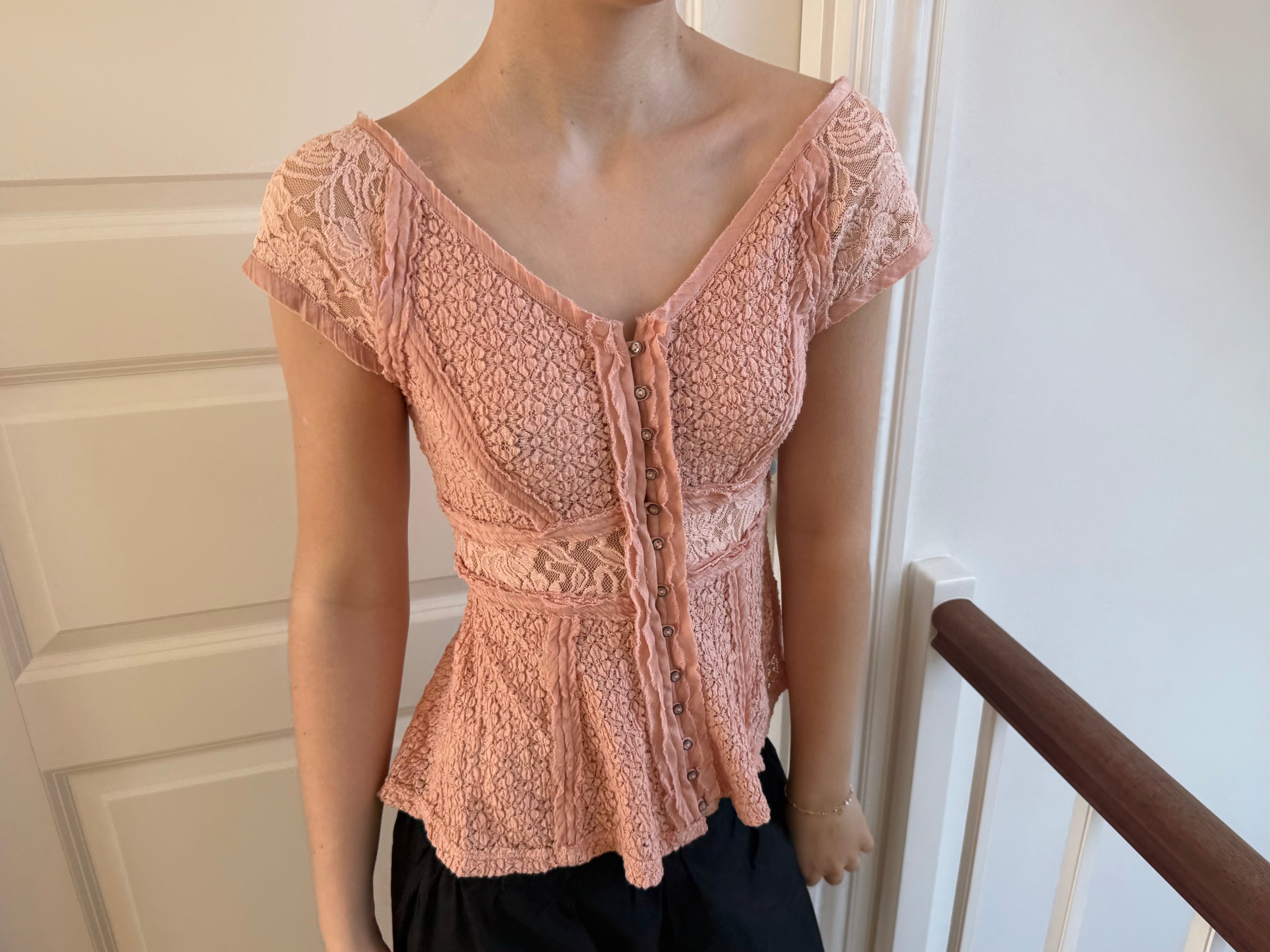 Coral-colored lace top