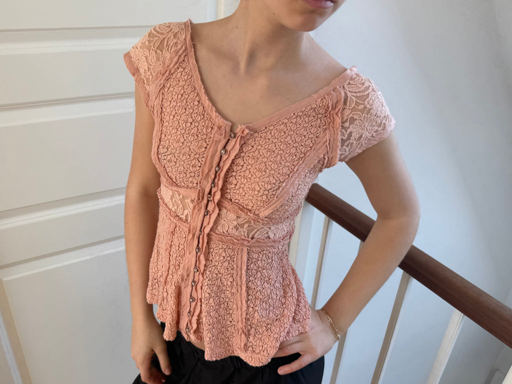 Coral-colored lace top