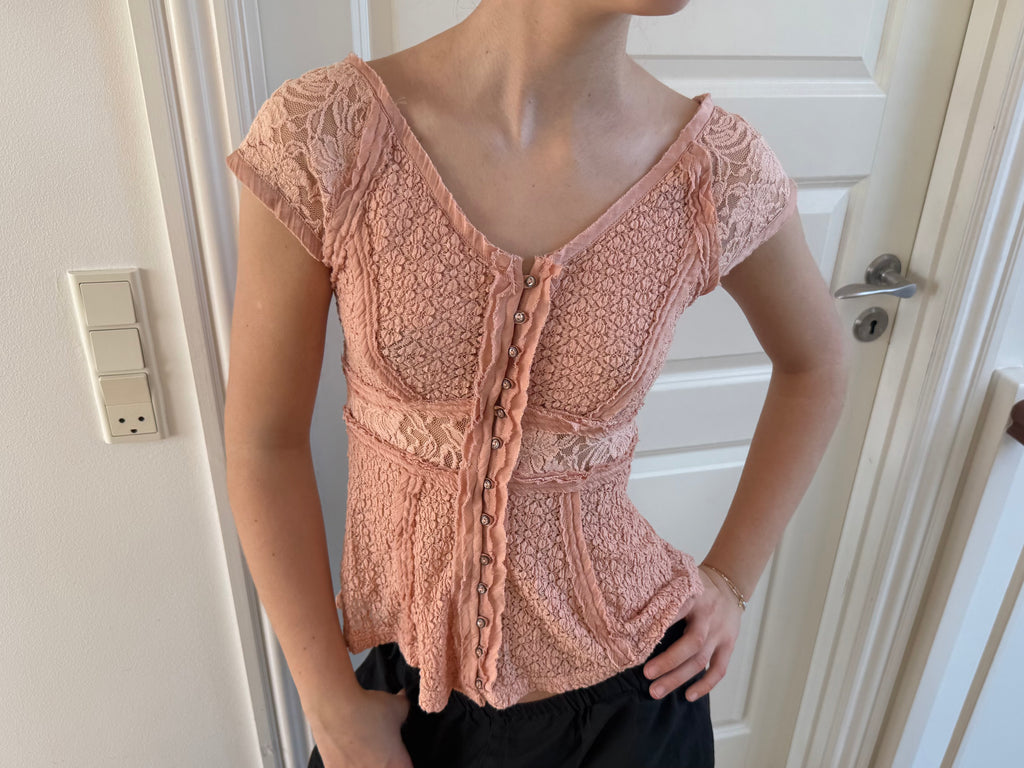 Coral-colored lace top