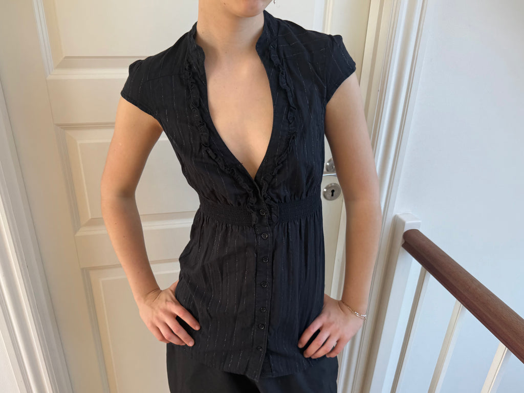 Black top with deep neckline