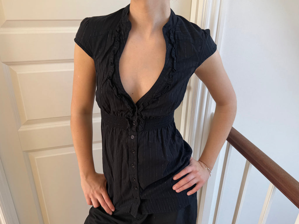 Black top with deep neckline