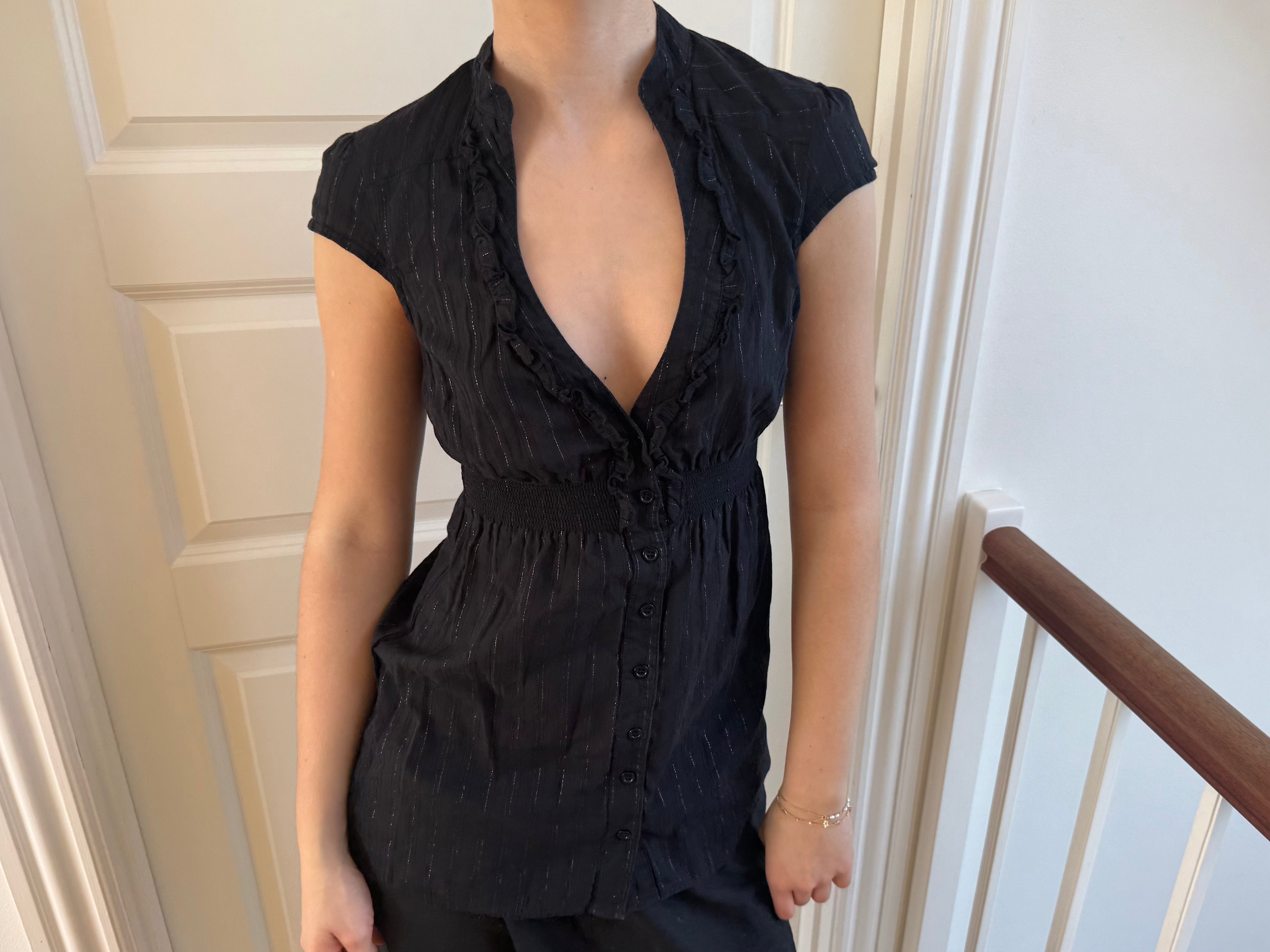 Black top with deep neckline