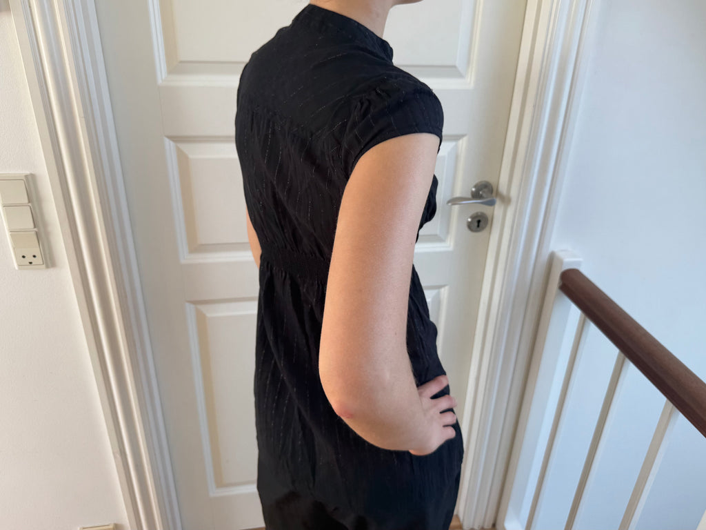 Black top with deep neckline