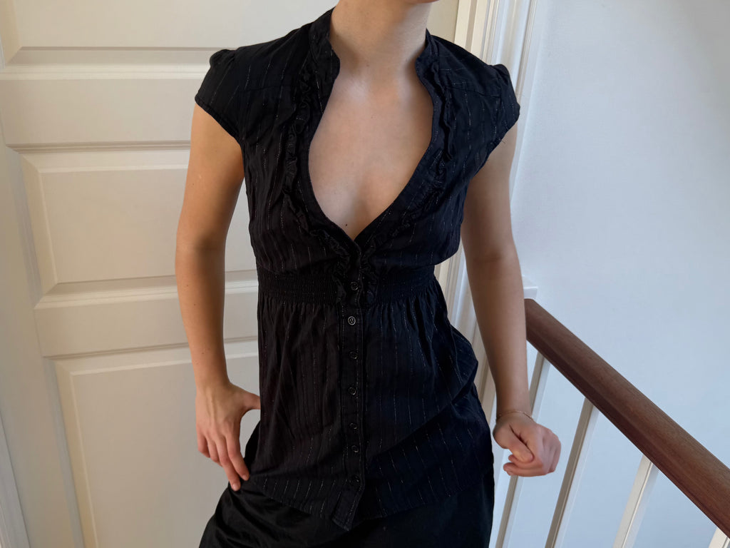 Black top with deep neckline